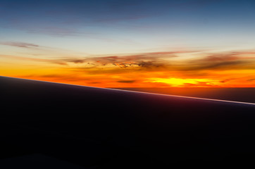 Fototapeta na wymiar Sunset view from airplane