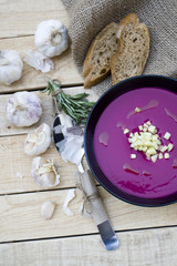 Cold red beet soup and ginger. Garlic, rye baguette and rosemary