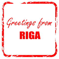 Greetings from riga, red rubber stamp with grunge edges
