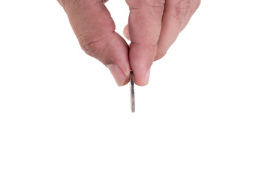 man hand putting a coin isolated on white background