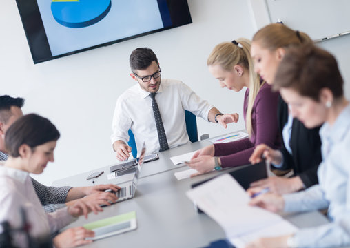 young business people group on team meeting at modern office