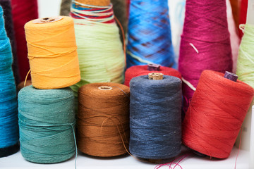 The set of spools of sewing thread