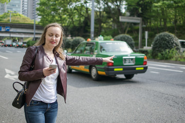 White Female Trying To Hail Taxi