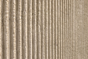 Section of wall, dirty white vertical pattern
