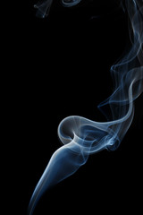 Abstract blue smoke from aromatic sticks.