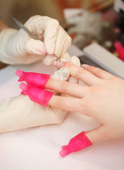 Preparing to manicure nails.