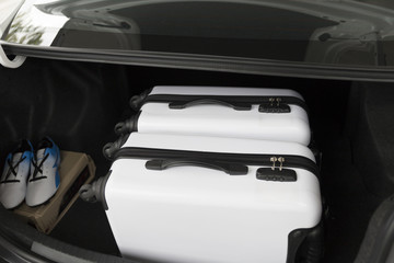 baggage in car trunk for traveling concept