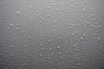 water drop on gray surface