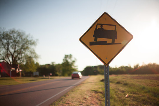 Uneven Road Sign