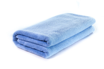 Light Blue soft bath towel isolated on white background