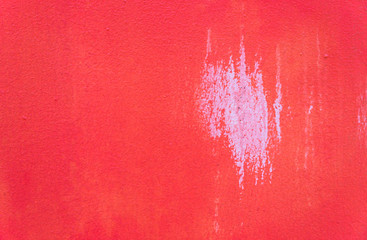 Closeup dirty white color on orange color wall