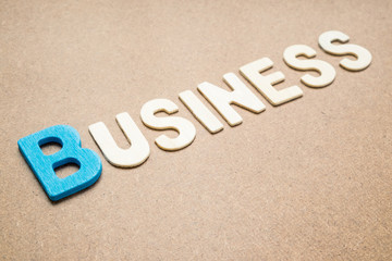 Text 'Business' wording on brown background