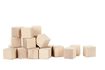 Obraz premium Wooden toy cubes isolated on a white