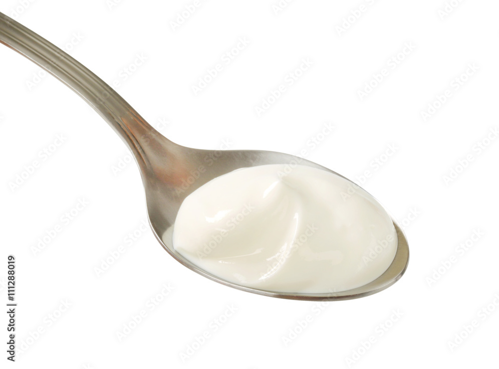 Poster White yogurt on a spoon