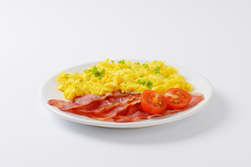 scrambled eggs and pan fried bacon