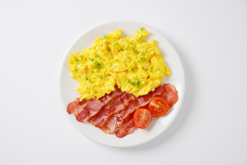 scrambled eggs and pan fried bacon