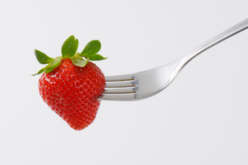 strawberry on fork