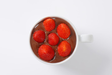 strawberries in chocolate pudding