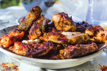 chef grilling lamb ribs on flame