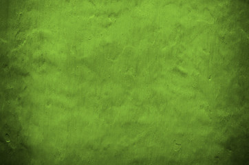 Obraz na płótnie Canvas green painting on concrete wall