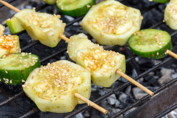Zucchini and cucumber on the kebab grilling