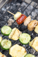 Meat and vegetables on the hot grill