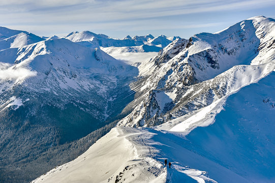 Winter panorama of mountains above the clouds. View of the High Tatras, nature