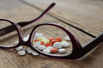 Medical pills and glasses