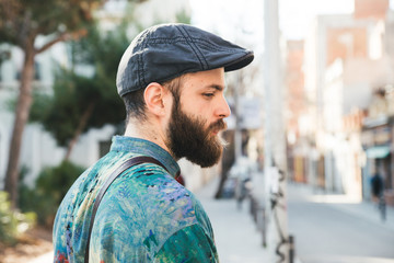 Portrait of hipster man on the street