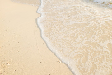 Fototapeta na wymiar Sand of beach with sea wave