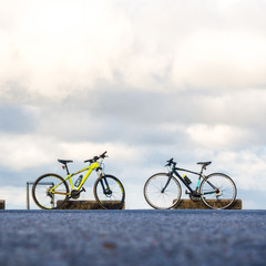 Fototapeta premium Bicycle parked on road the top of mountain.