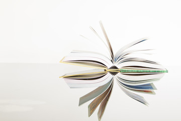 Open book isolated on white background.