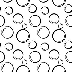 Bubbles geometric seamless pattern. Black circles on white background. Fashion graphic design. Modern stylish abstract texture. Template for prints, textiles, wrapping, wallpaper. VECTOR illustration.