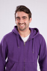 Fototapeta premium Happy man smiling at the camera