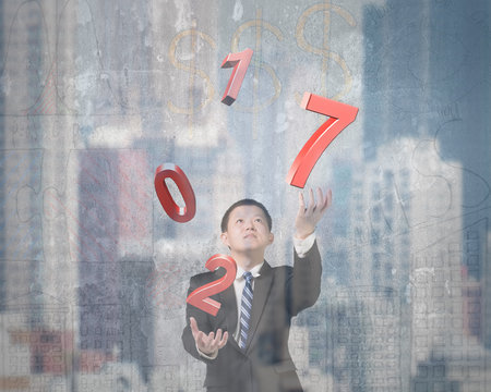 Man catching throwing 2017 red words