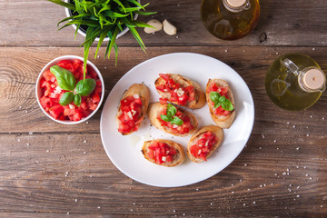 Bruschetta with tomato, onion and basil