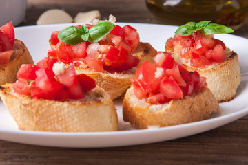 Bruschetta with tomato, onion and basil