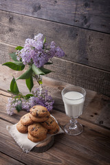 Stack of cookies with glass of milk