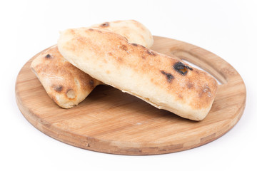 Turkey somun bread on the kitchen cuting wooden board