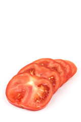 Macro closeup sliced tomato over white background copy space