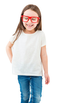 Laughing happy milk teeth kid girl . Fashionable stylish beauty with long hair. Casual white tshirt no print. Empty space for your logo or image. Template for branding. White background