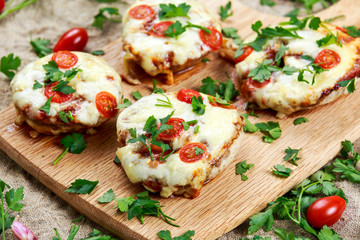 Cooked Mushrooms stuffed with cheese and plum tomatoes