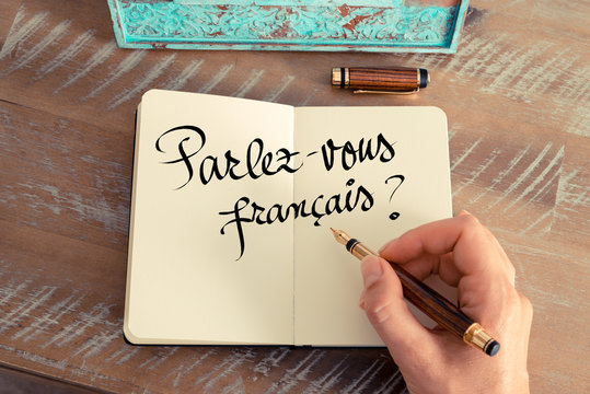Handwritten text "Parlez-vous francais?" in French- translation : Do you speak French?