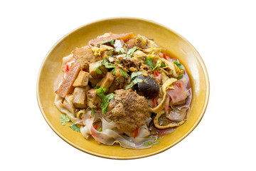 china noodle mixed with egg, sausage, pork, mushroom and tofu on white background and clipping path