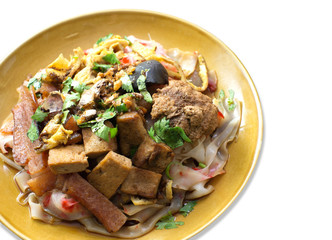 china noodle mixed with egg, sausage, pork, mushroom and tofu on white background