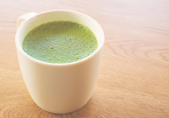 hot green tea latte, vintage effect