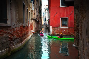 Venice, Italy - 19 September 2015: View of tourists rowing kayaks