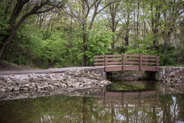 Bridge Over Peaceful Pond