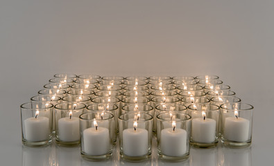 Rows of Votive Candles