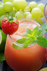 Fresh strawberry drink with lime and mint